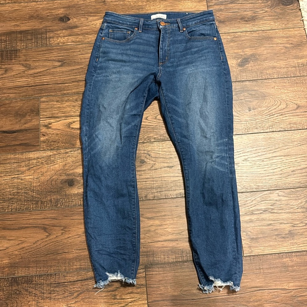 Distressed hem jeans